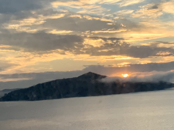 I woke up, looked out the window to see this incredible sunrise over Angel Island.